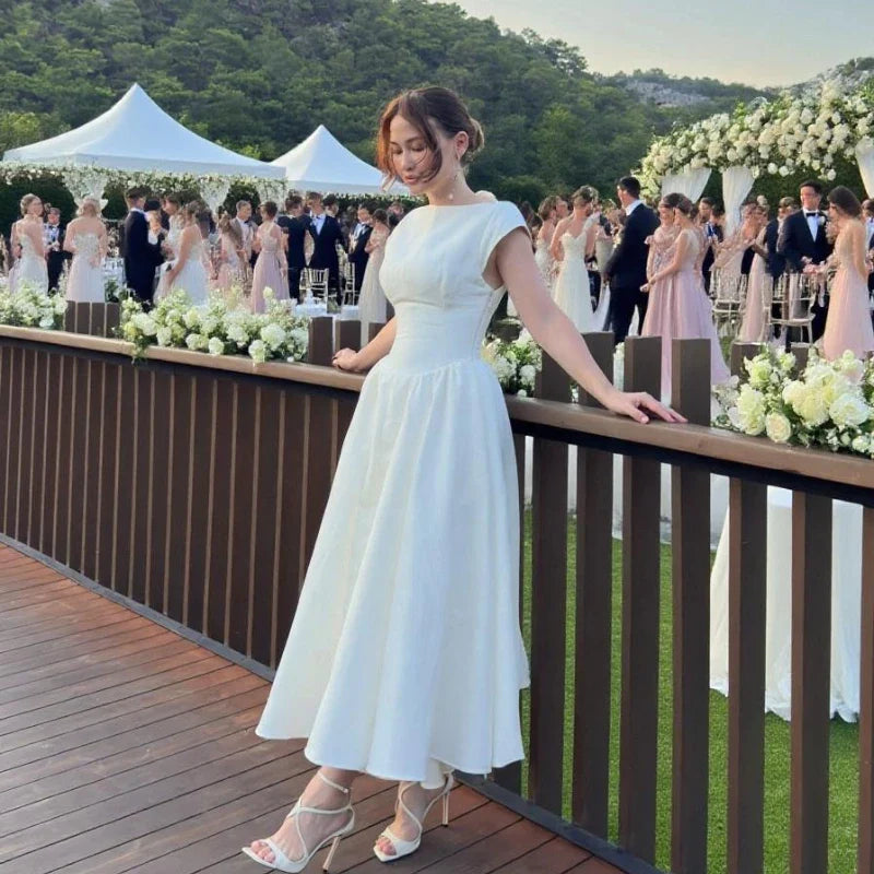 Vestido midi Rosalind sin mangas con aberturas
