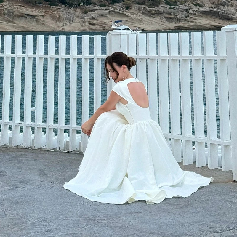 Vestido midi Rosalind sin mangas con aberturas
