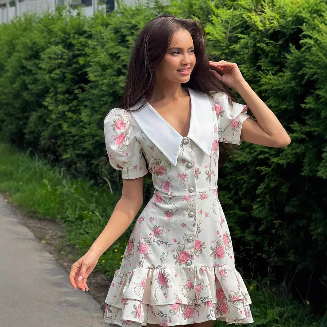 Vestido mini Andromeda floral con mangas abullonadas