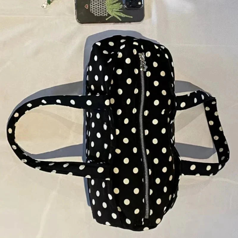 Bolso mini Kate tipo duffle de lunares