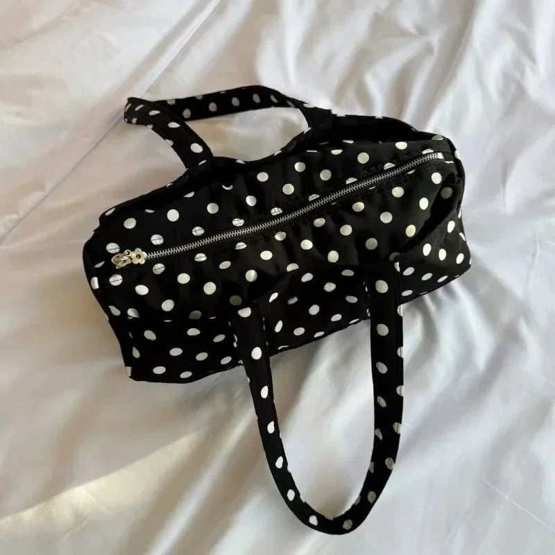Bolso mini Kate tipo duffle de lunares